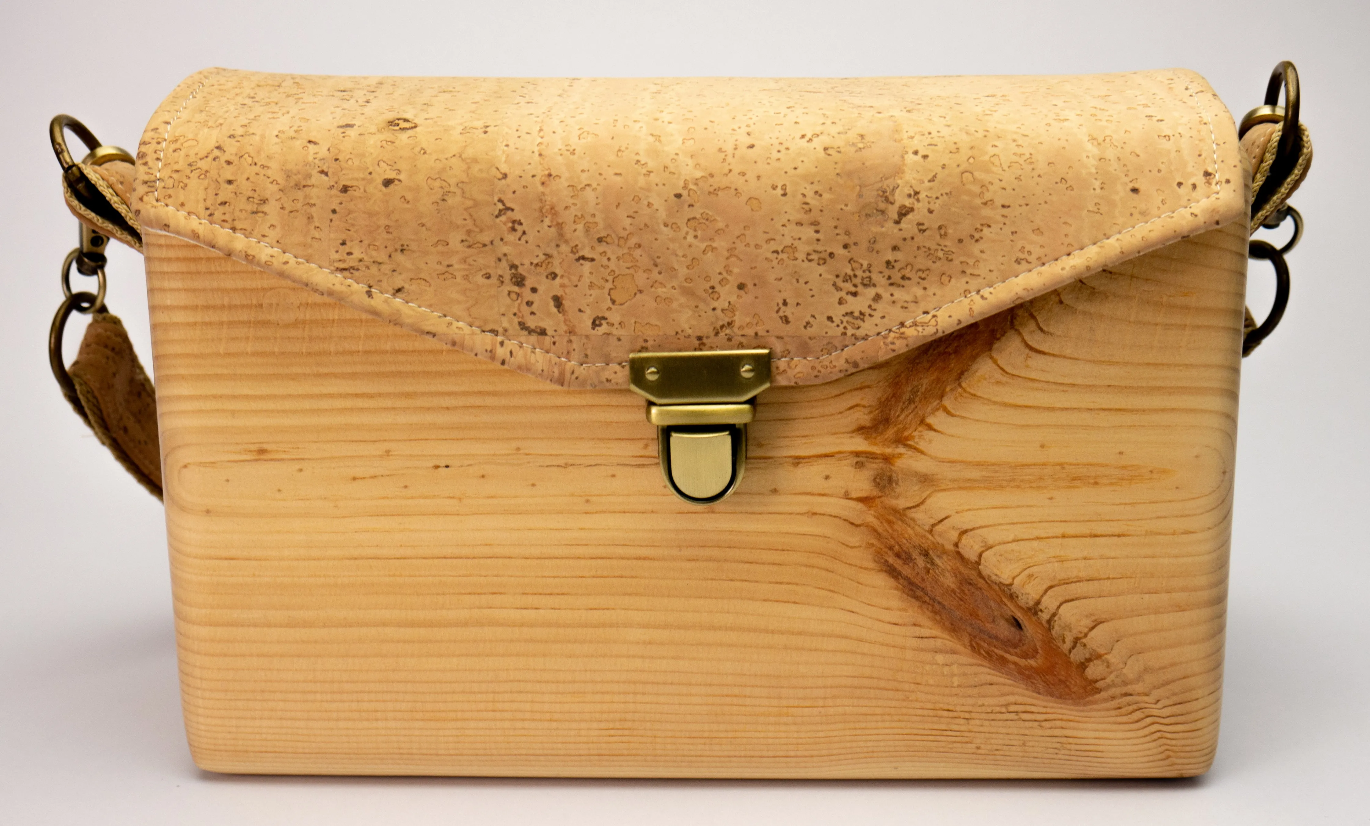 An Eco-Friendly wooden handmade crossbody bag with natural cork leather.