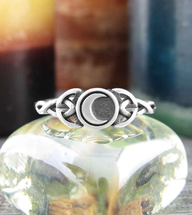 Crescent Moon Bounded By Celtic Knots Ring